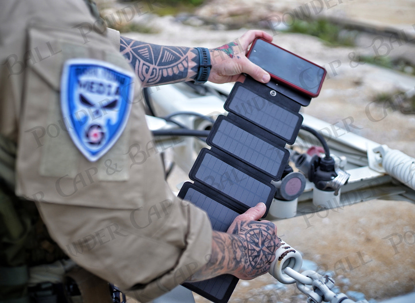 Solar charger with built in USB-C cable and USB port